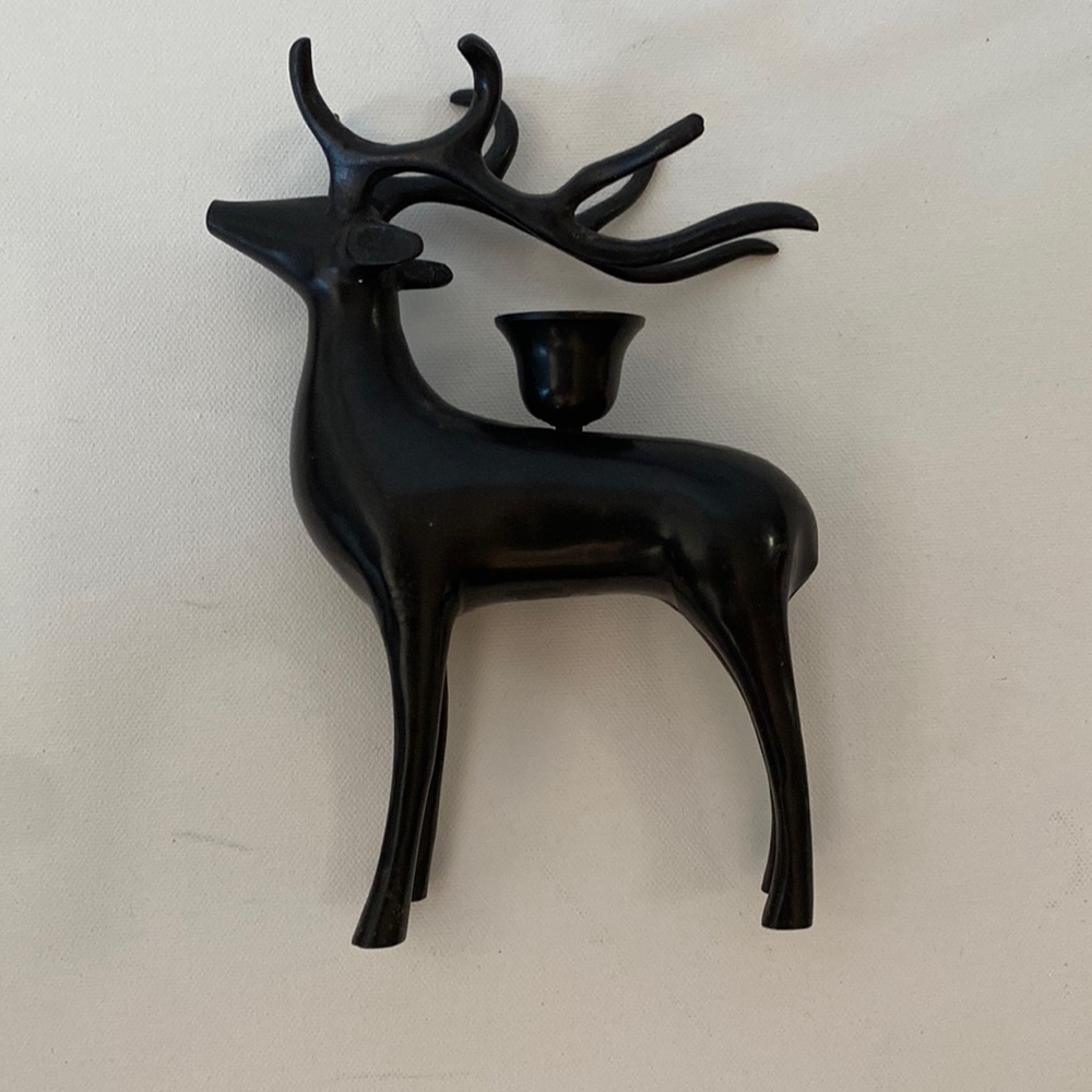 Pottery barn black deer candleholder.